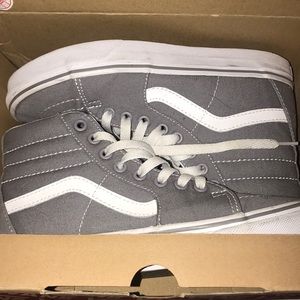 Grey and white hightop vans